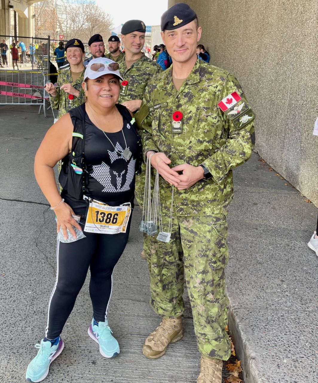 Carmen Receiving her medal at the end of the 10K Army Run